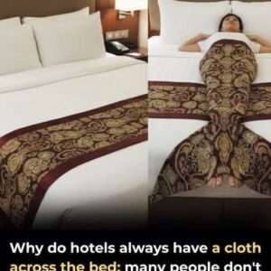 The Hidden Purpose Behind the Fabric Strip at the End of Hotel Beds